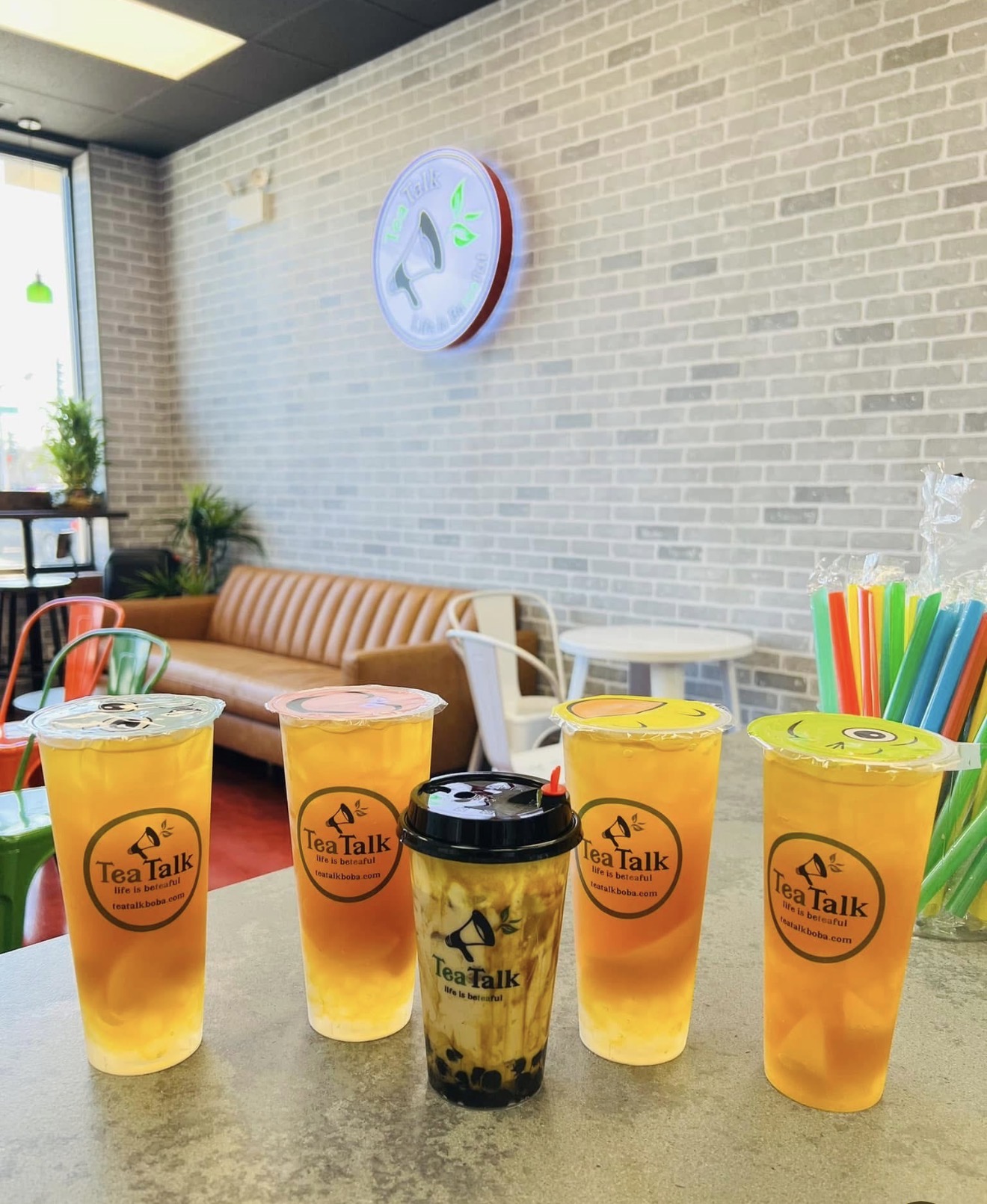 TeaTalk Boba lineup of fresh fruit teas with fruit-shaped lids